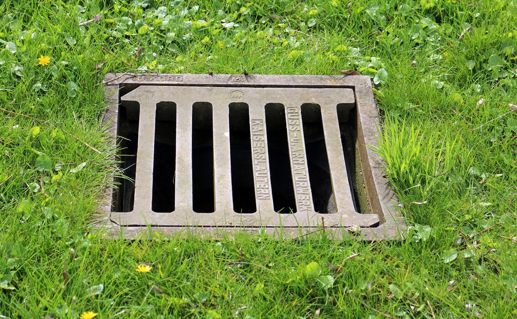 Gully cover that leads to drainage pipe below