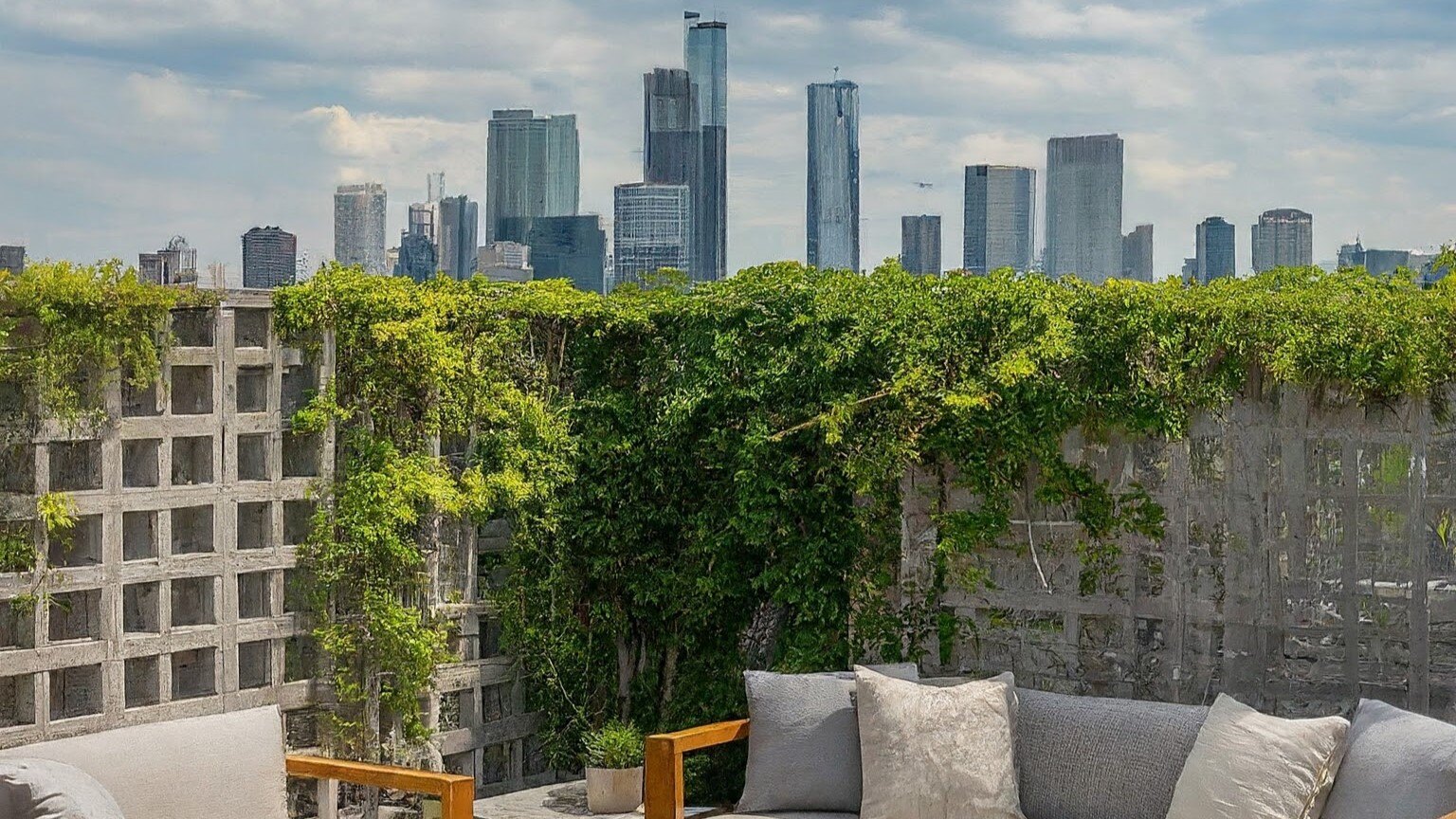 Rooftop hideout in the city surrounded by breeze blocks that help with ventilation and thermal regulation.